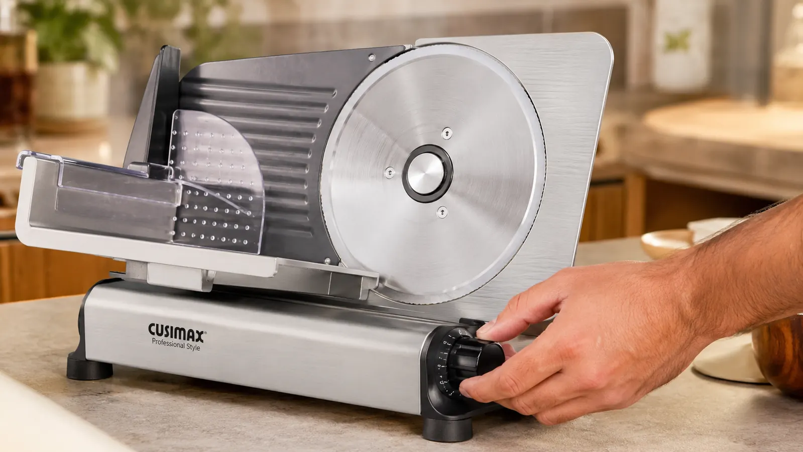 Hand adjusting the thickness dial on a stainless steel meat slicer before slicing deli meat
